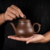 Teapot with tea leakage filter liner