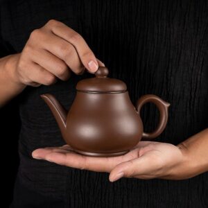 Teapot with tea leakage filter liner